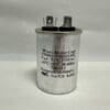 A silver cylindrical capacitor with two top prongs, labeled CBB65-370R505-M2 5 uF 370 VAC Capacitor, featuring technical specifications including 5 μF, 370VAC, 50-60Hz, RoHS compliant.