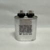 A Scotsman 18-3701-01 Run Capacitor (CBB65-370V805-M2), featuring a silver casing with two terminals on top, is labeled 8 µF ±10% 370 VAC, 50–60 Hz, has an operating temperature range of -40°C to 85°C, and displays various certifications printed on the front.