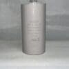 A cylindrical Italfarad capacitor labeled RPN2F306-M1 30 uF 400/450 VAC Capacitor 9312400300500, with technical details printed on it, stands upright on a white surface against a light-colored fabric background.